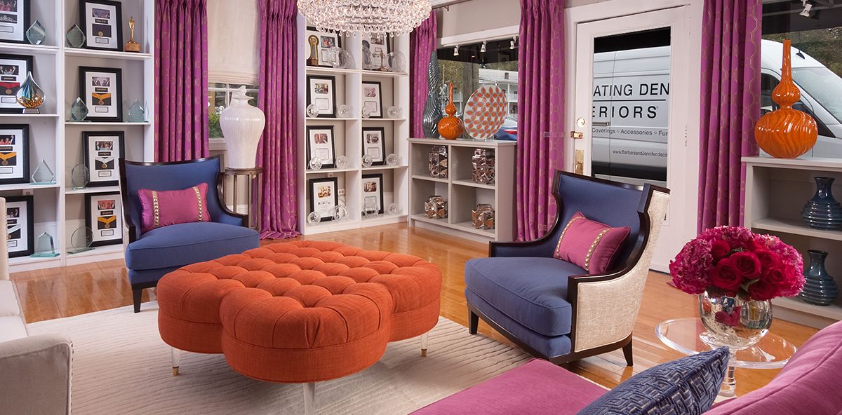 Room with bright purple, orange and pink furniture