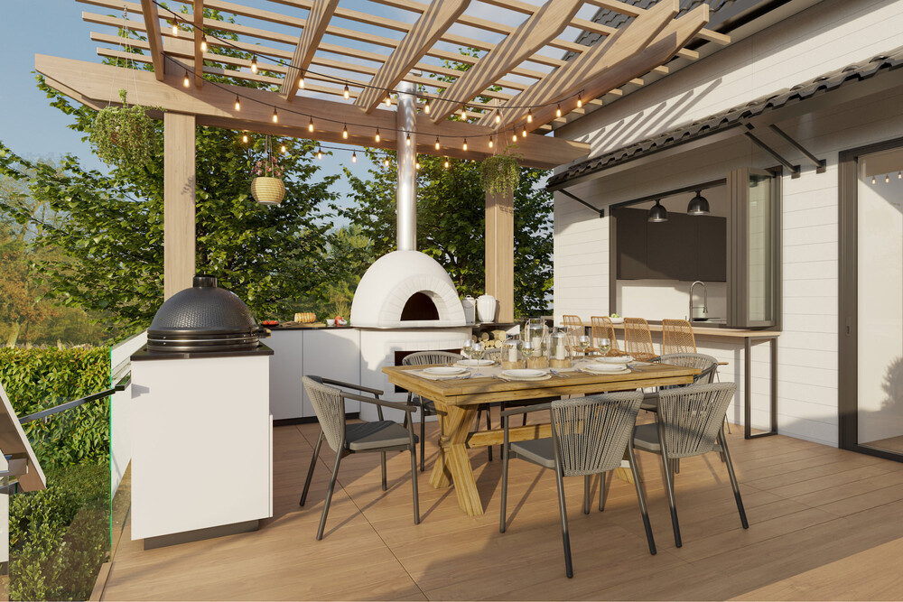 Outdoor kitchen with a dining table and chairs