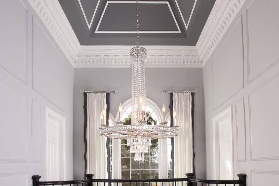 Handing Light Hand Cut Crystal Olde Silver Chandelier from a tall ceiling