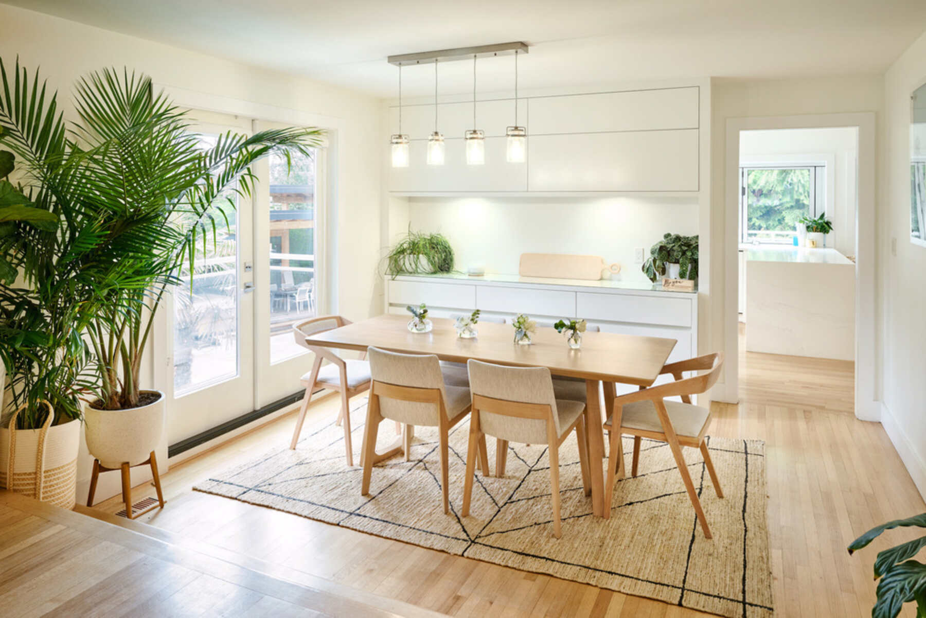 Opulent dining room featuring a tastefully arranged table and exquisite chairs