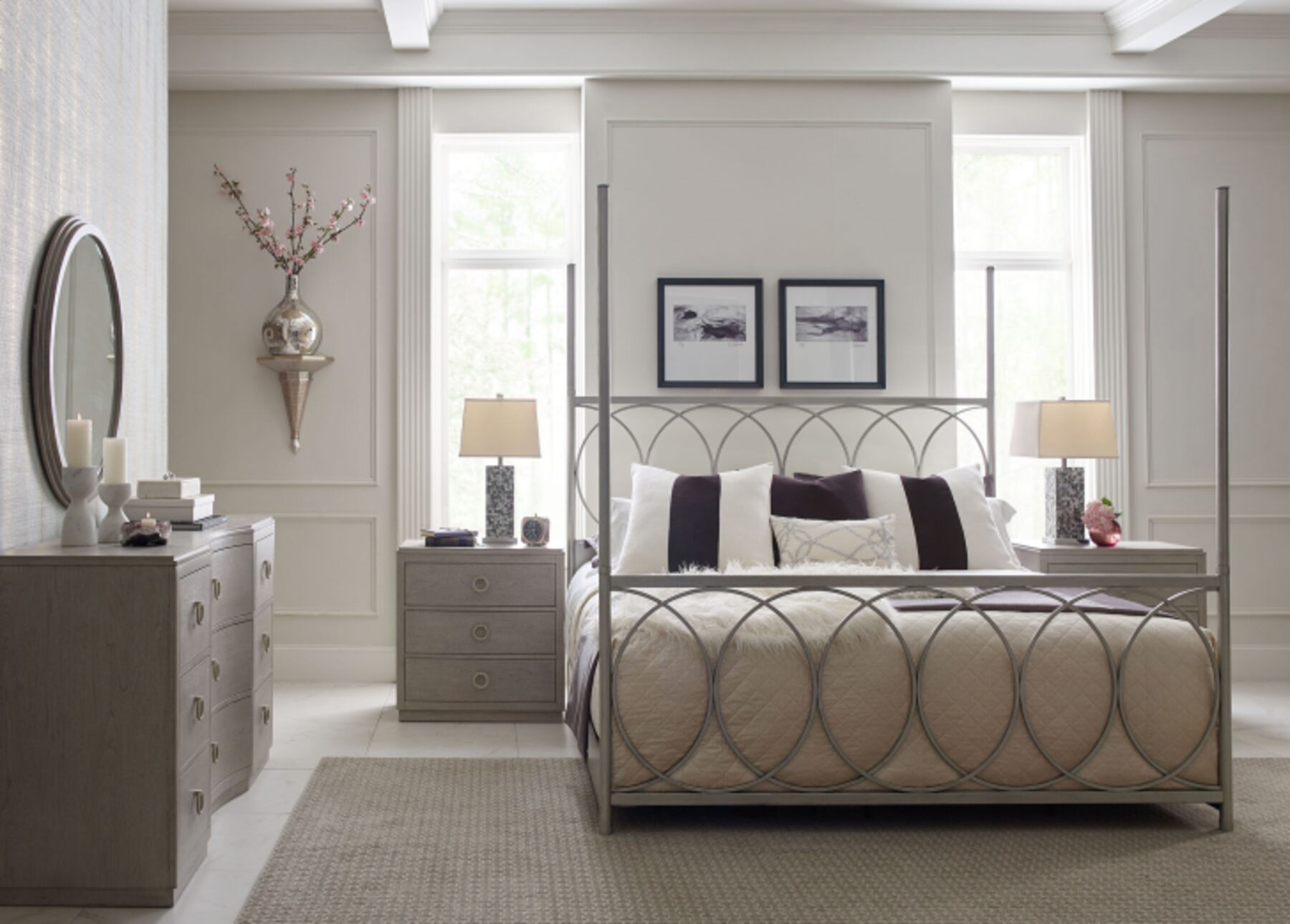 Interior of a bedroom featuring a bed, dresser, and mirror