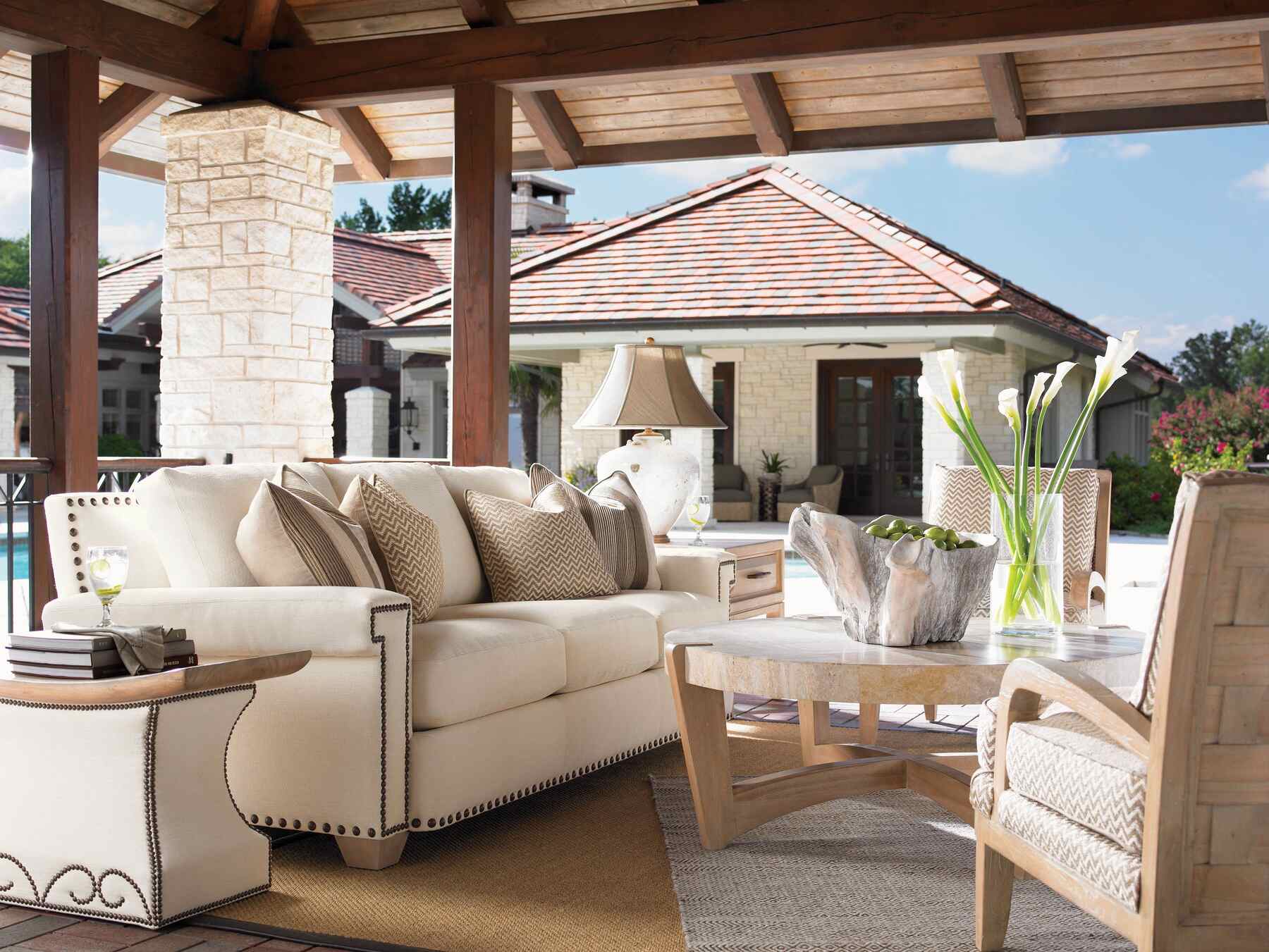 A cozy patio with comfy furniture and a sparkling pool, perfect for relaxing and enjoying the outdoors