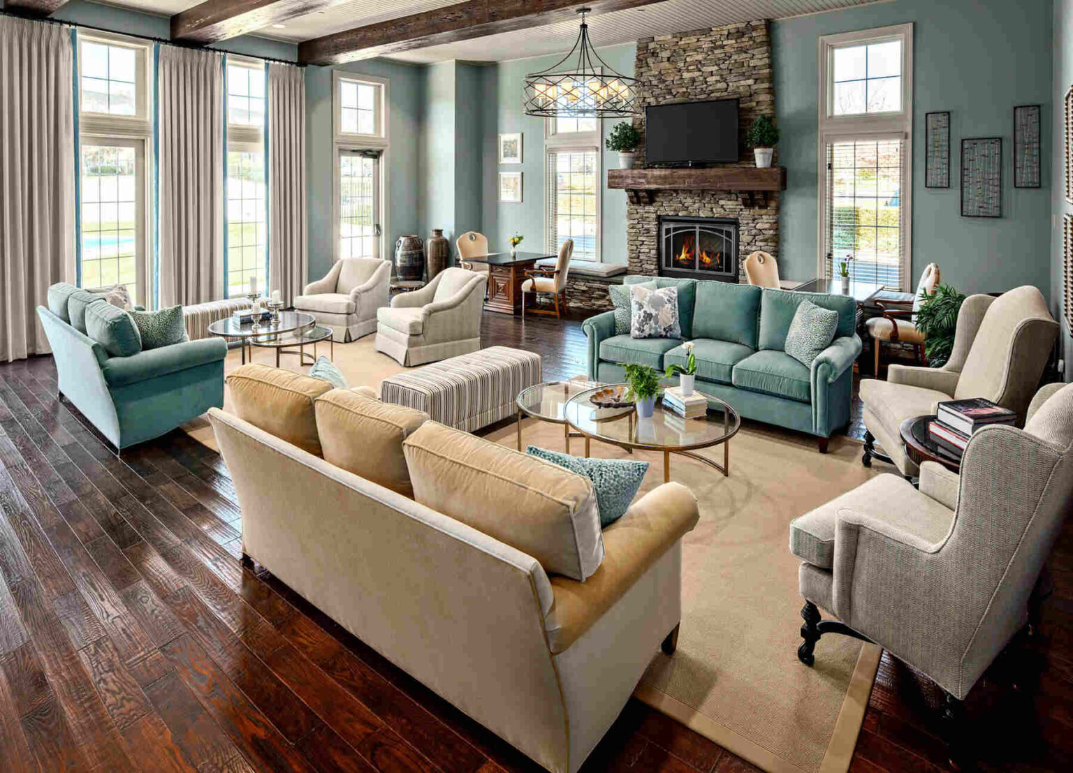 Living room with two varying furniture style sets and colors